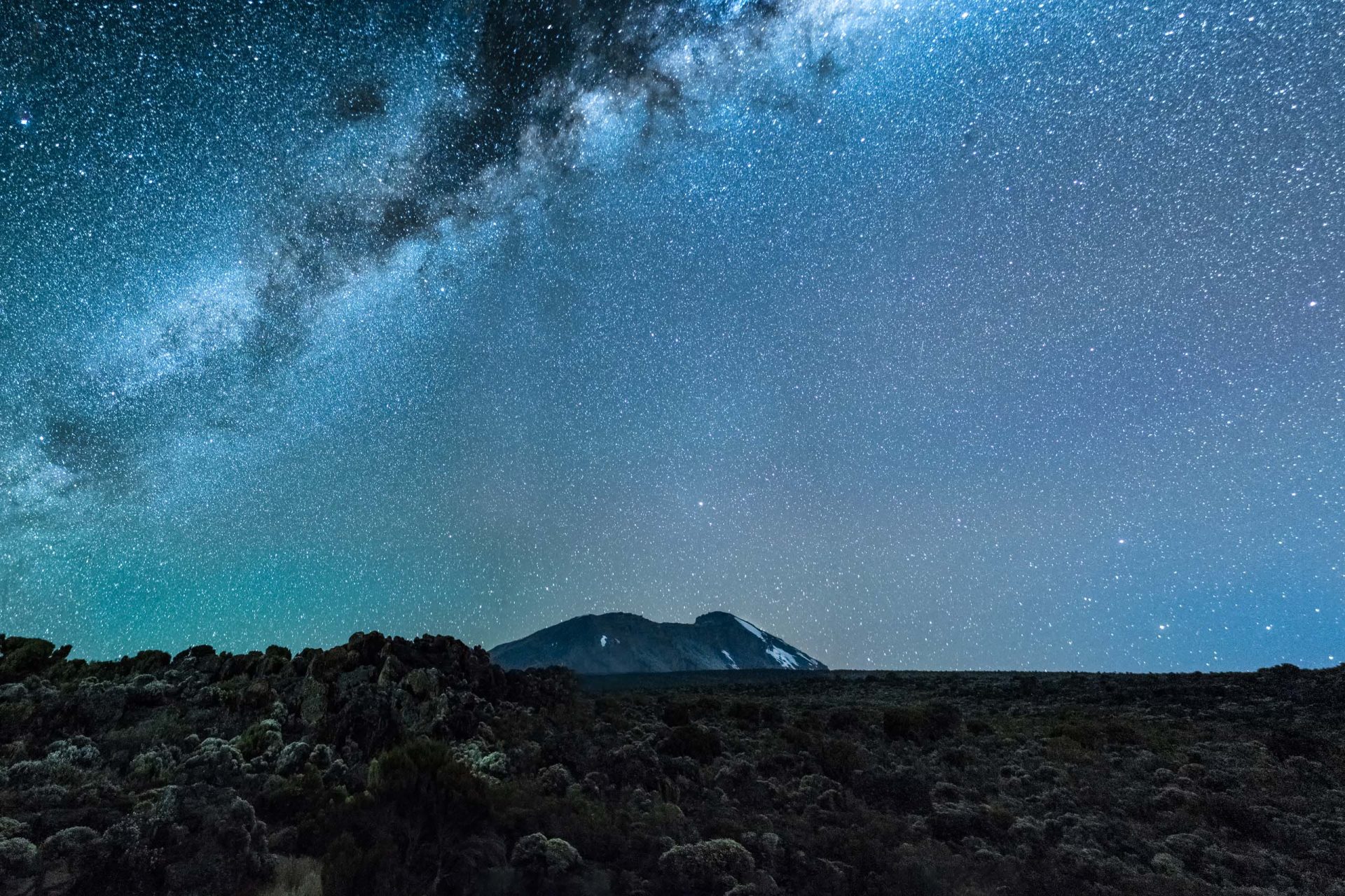 Mount Kilimanjaro under the Milky Way skies. At 4000 Mts above sea level you can experience the most amazing peaceful skies while hiking to Kilimanjaro.